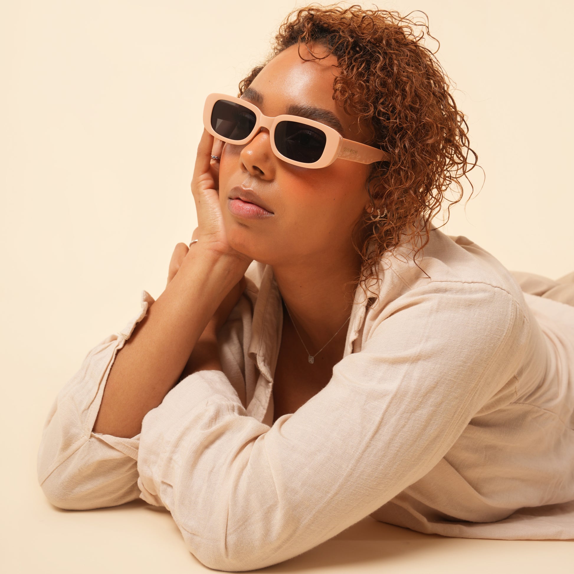 female model wearing sonder sunglasses in pink